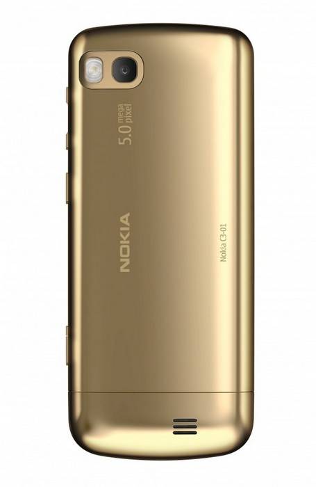Мобильный телефон Nokia в золотом корпусе